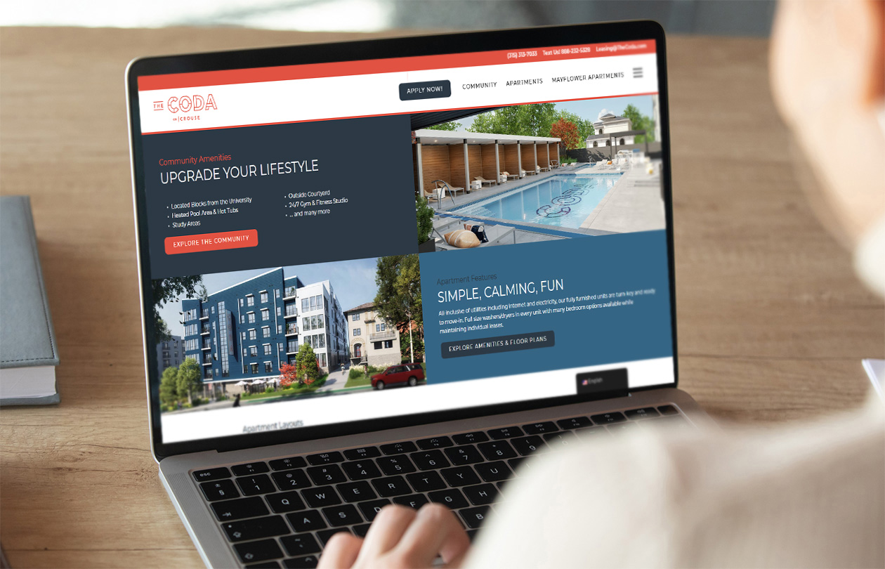 The Coda apartment website design on laptop