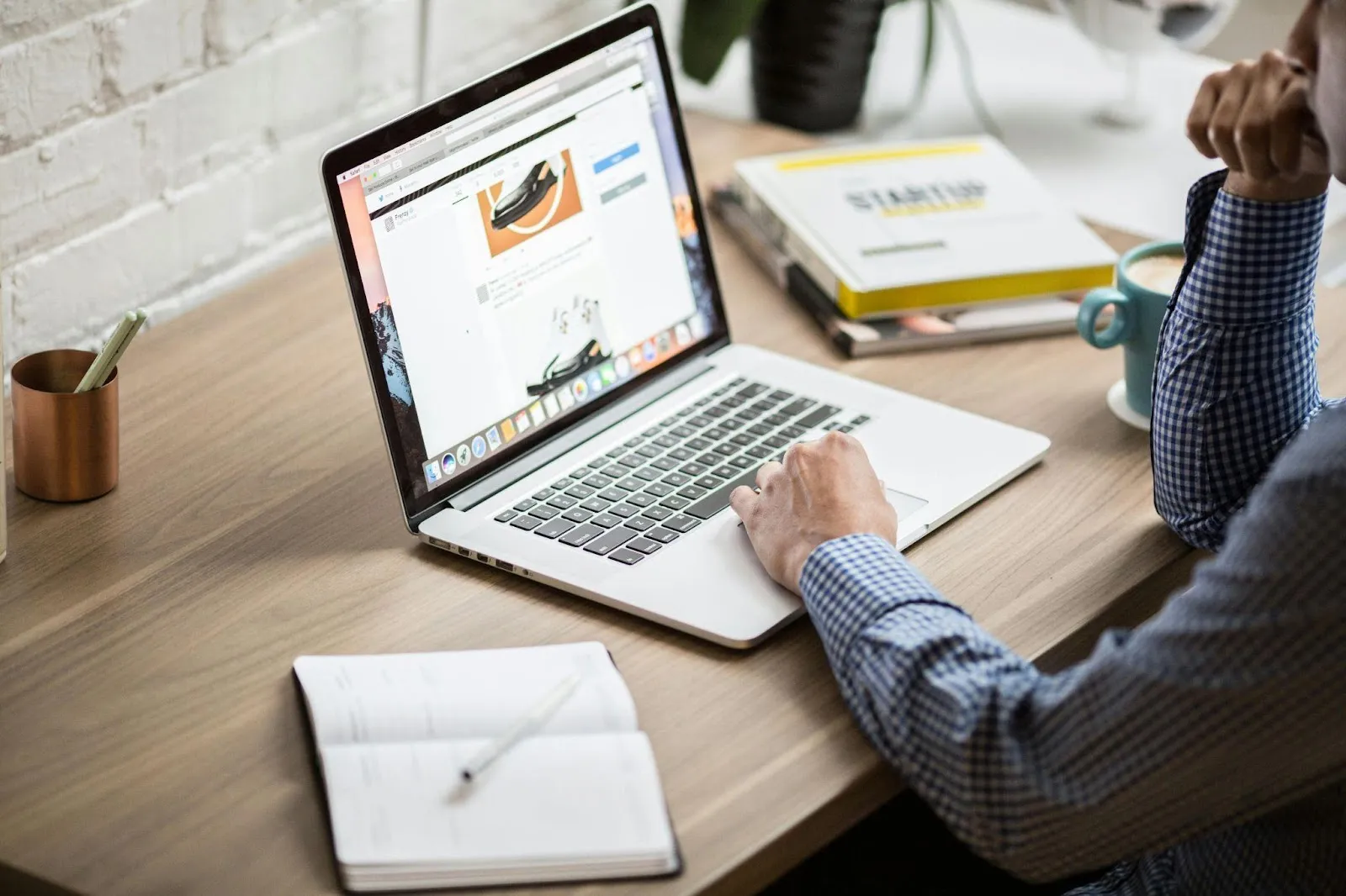 map on laptop searching web design and development companies jackson hole and boulder