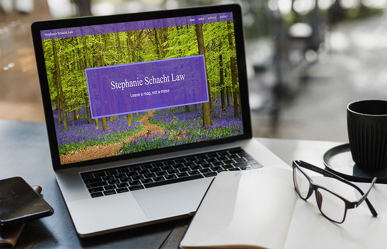 laptop with Stephanie Schacht Law website