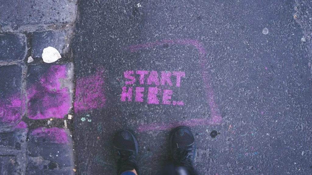 Purple hop scotch starting square says "Start Here"