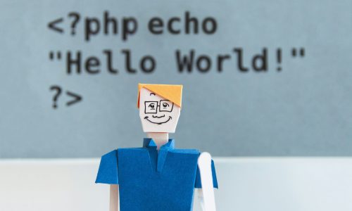 Paper cut-out man waving with PHP Hello world above
